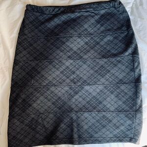 Size Large, mini pencil skirt, stretch fabric. Really cute with boots, leggings.